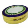 Snuff Box or Pill Box in 925/1000 sterling silver gold plated with translucent fired enamel on guillochè and hand painted miniature of floral wreath. Back side