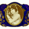 Salimbeni Guilloche Frame Hand-Engraved Shaped photo frame with oval interior in 925/1000 sterling silver gold plated . Oval Shape with blue back ground and gold plated hand-carved decoration. Right side front view