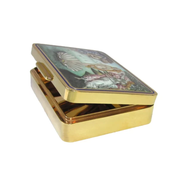 Birth of Venus Box Salimbeni is a table box, rectangular with rounded corners in 925/1000 sterling silver gold plated. Birth of Venus Box has a fine hand-painted, fire-enameled miniature signed by the painter Beatrice Mellana, reproducing the famous painting "Birth of Venus" by Sandro Botticelli kept in the Uffizi Gallery in Florence. lateral side with semiclosed cover